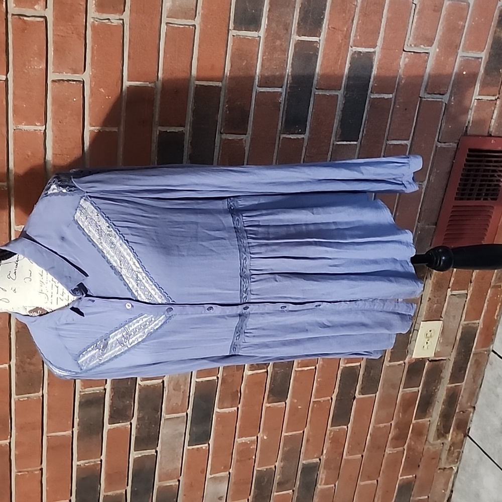 Free people long sleeve button down size medium blouse.